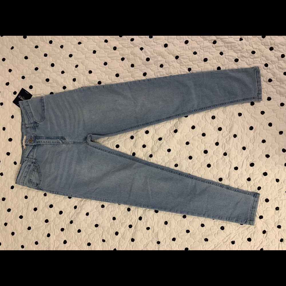 Brand new jean tags still attached